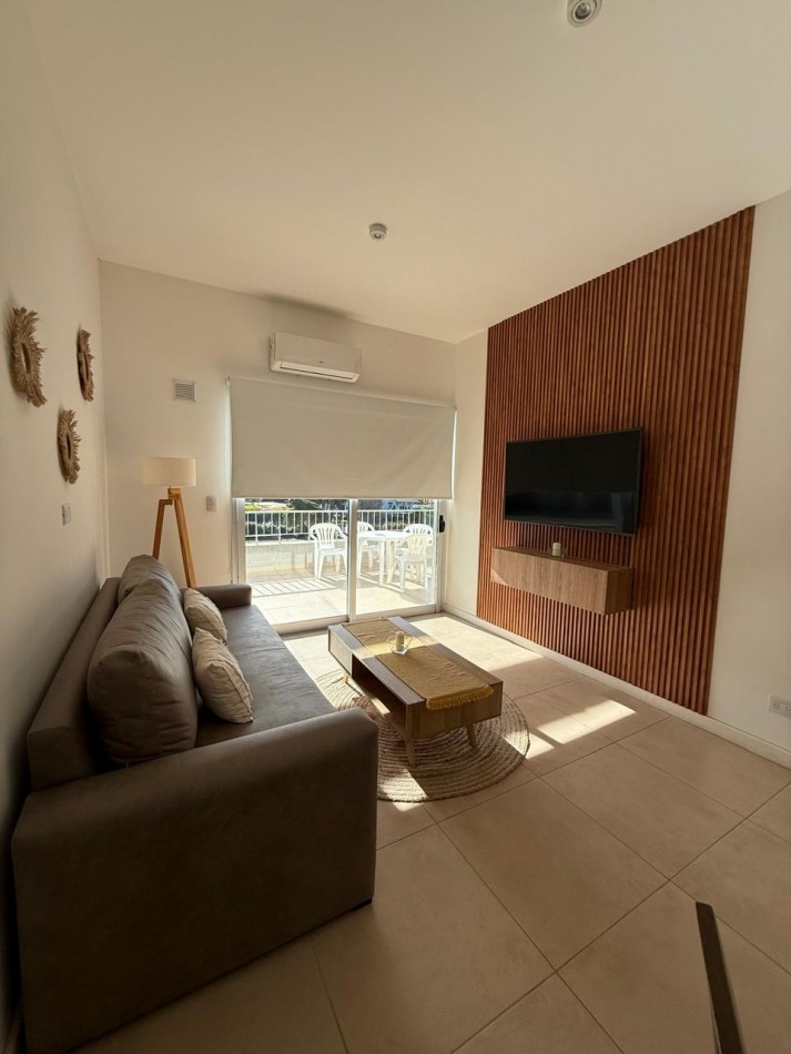 Departamento a la venta, amplio, luminoso, 2 ambientes, con gas natural, losa radiante y cochera 