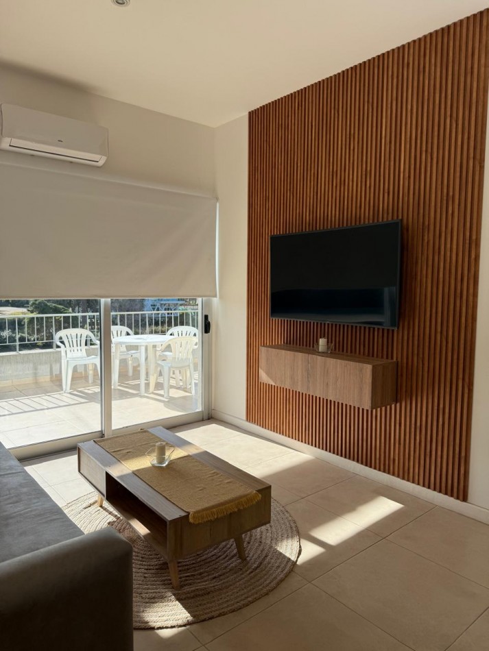 Departamento a la venta, amplio, luminoso, 2 ambientes, con gas natural, losa radiante y cochera 