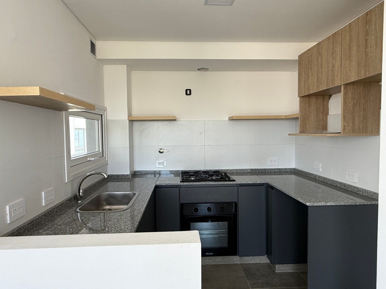 Venta departamento de 2 ambientes en Pinamar, con terraza, gas natural, losa radiante y cochera