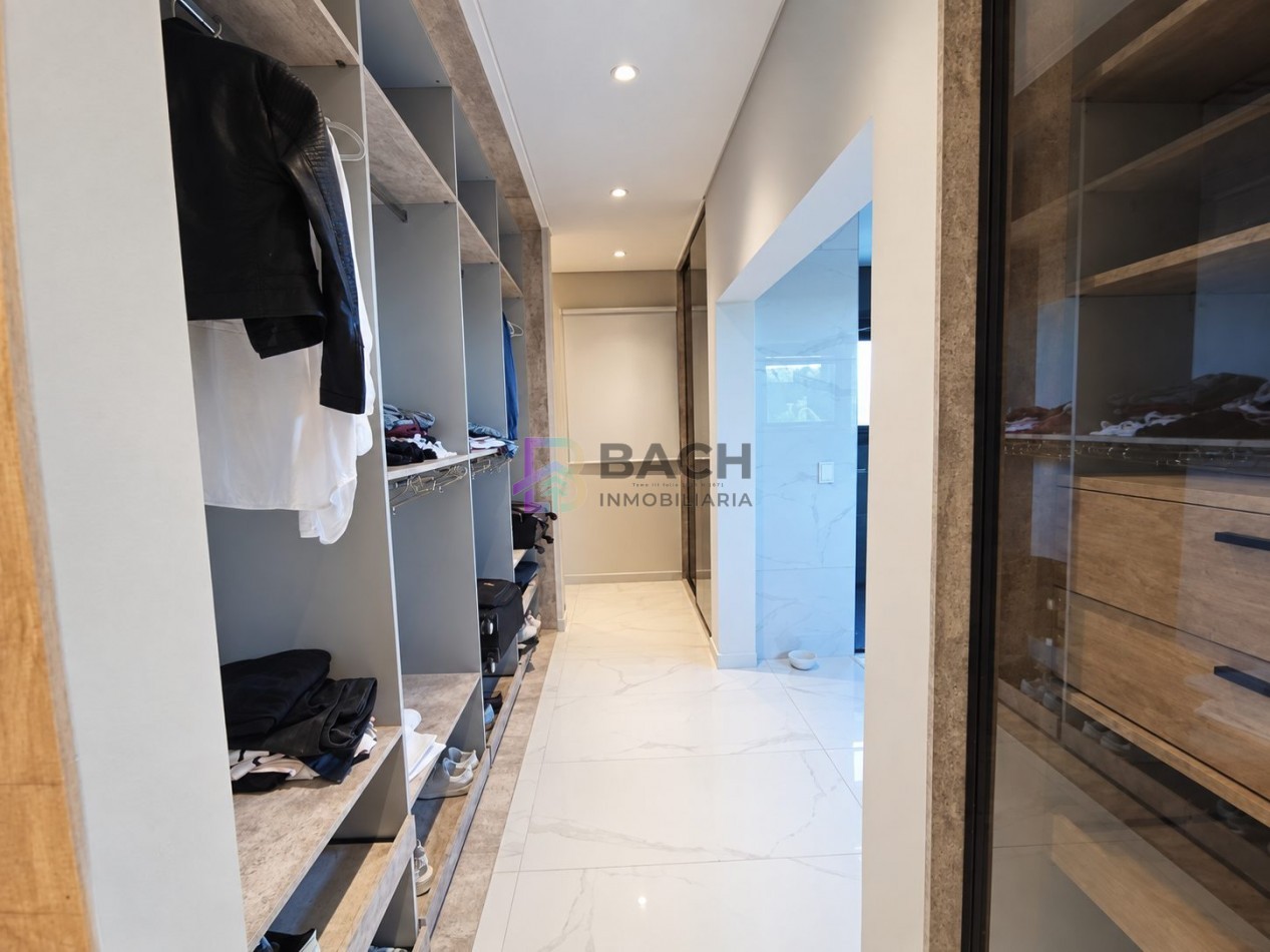 Moderna Casa en venta Costa esmeralda Golf2, con 4 dormitorios, psicina climatizada, hormigon visto