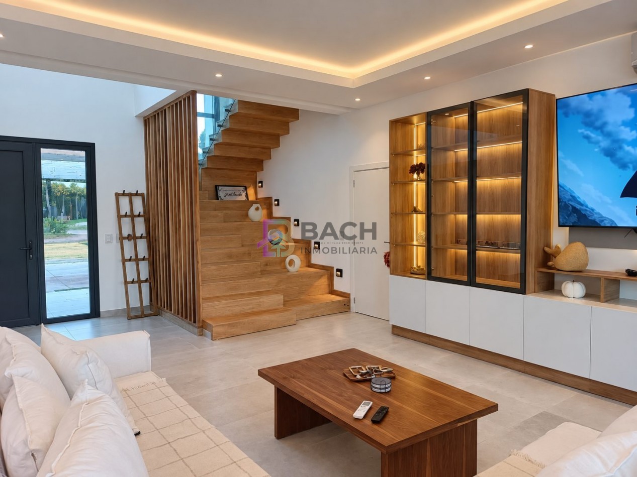 Moderna Casa en venta Costa esmeralda Golf2, con 4 dormitorios, psicina climatizada, hormigon visto