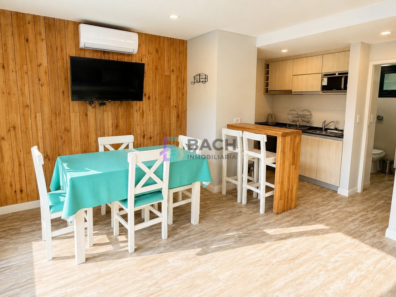 Departamento a la venta a metros del mar, con gran patio privado, permuta