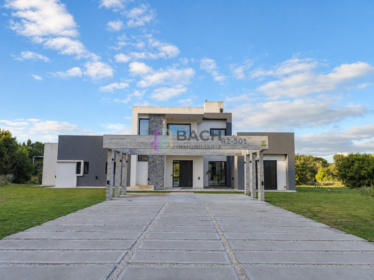Moderna Casa en venta Costa esmeralda Golf2, con 4 dormitorios, psicina climatizada, hormigon visto