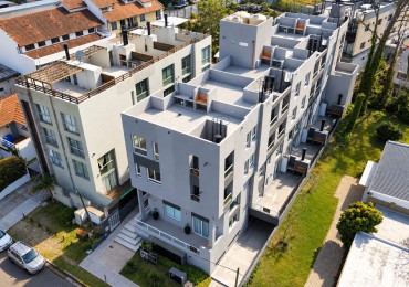 Venta departamento de 2 ambientes en Pinamar, con terraza, gas natural, losa radiante y cochera